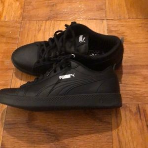 Leather black puma sneakers.